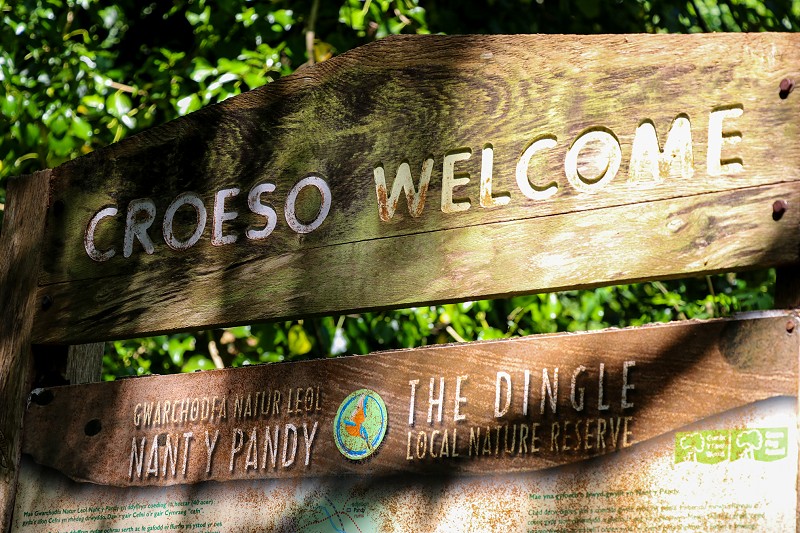 wooden croeso and welcome sign