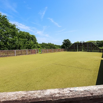 a football pitch in a park